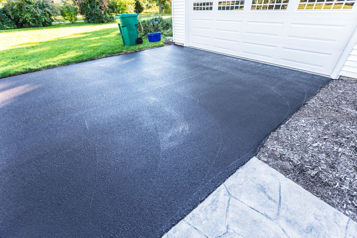 Can you provide more information about the pros and cons of resin driveways?