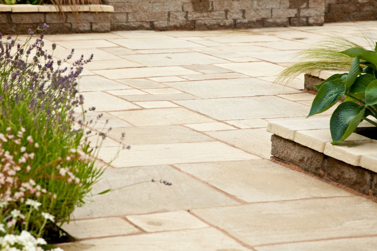 What are the advantages and disadvantages of resin stone driveways?